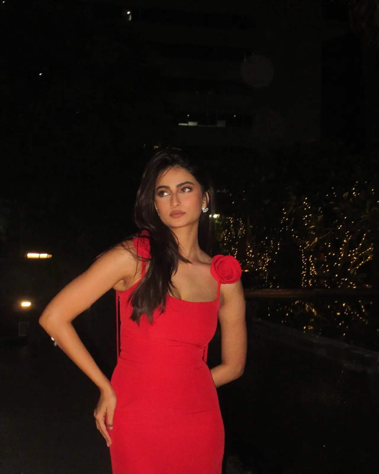 Palak Tiwari turns up the romance in a striking red dress, elevated with a rose detail—effortlessly channeling bold Valentine vibes with elegance and charm.